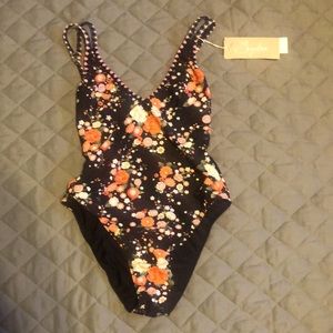 Women’s flora swimsuit with beadwork. Size M.